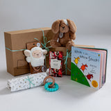 Farm-themed baby gift hamper with soft toy and organic babywear